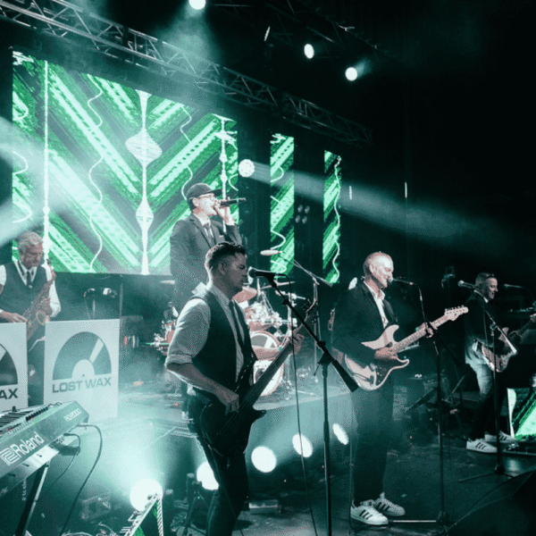 Lost Wax Band performing as a 10-piece ensemble, delivering high-energy live music for luxury weddings and upscale receptions.