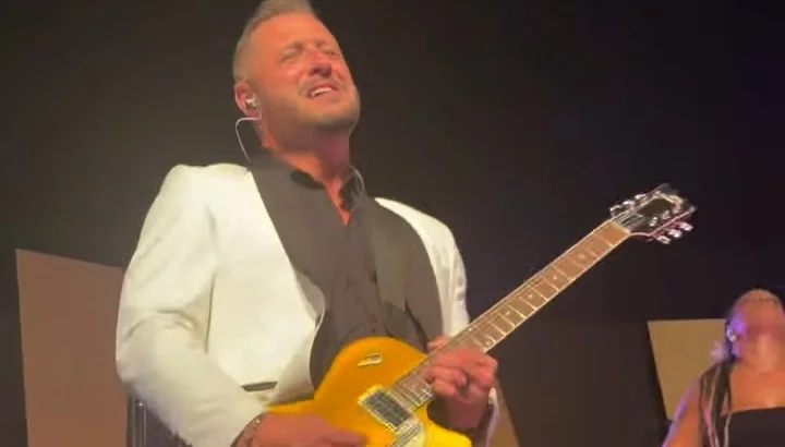 Lost Wax guitarist playing a gold electric guitar at the Nebraska Wedding Day Best of 2026 Awards Gala at The Leo Ballroom in Omaha, NE on June 16, 2026